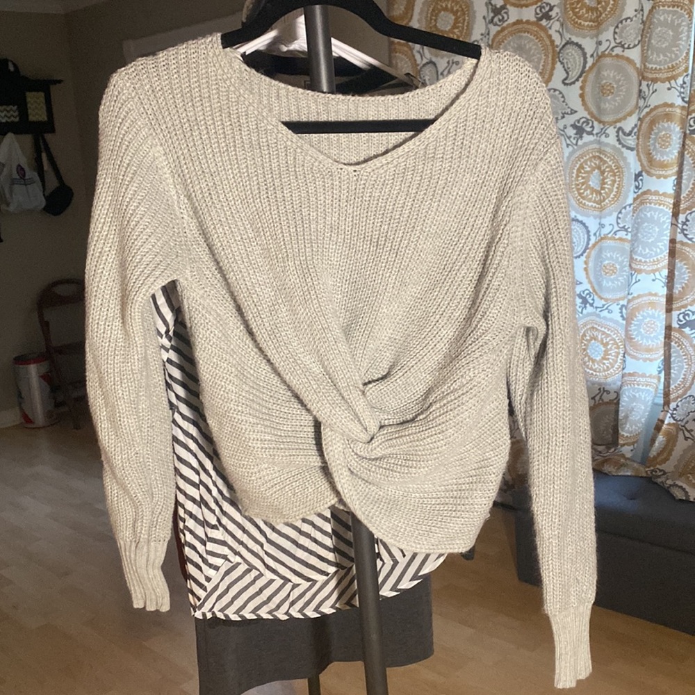 Grey knotted sweater